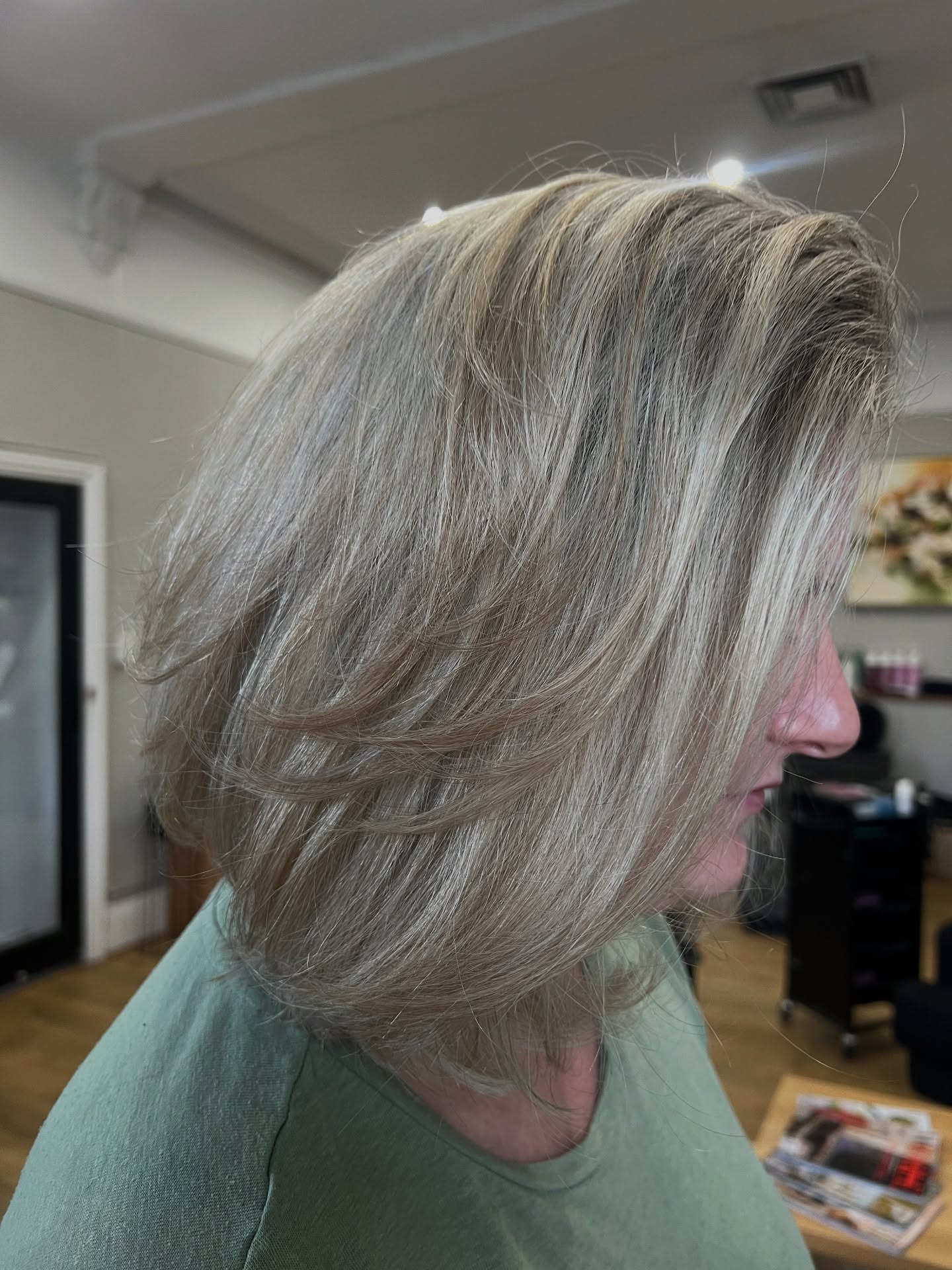 Layered blonde bob with lift and shine