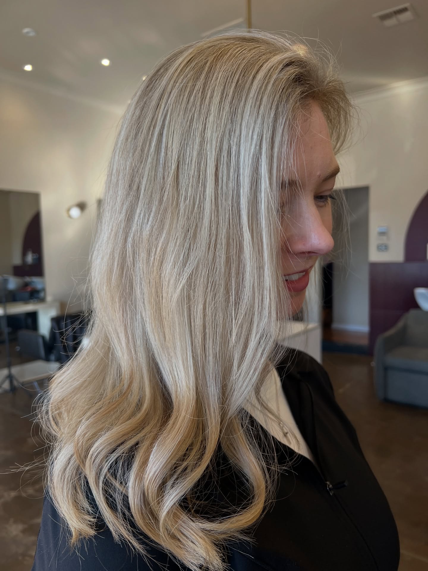 Icy blonde balayage with soft waves